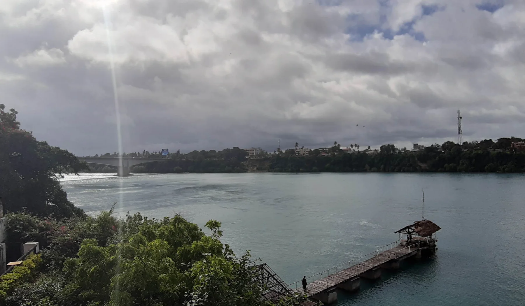 Kilifi Bridge, creek water and a jetty viewed from the Mnarani side