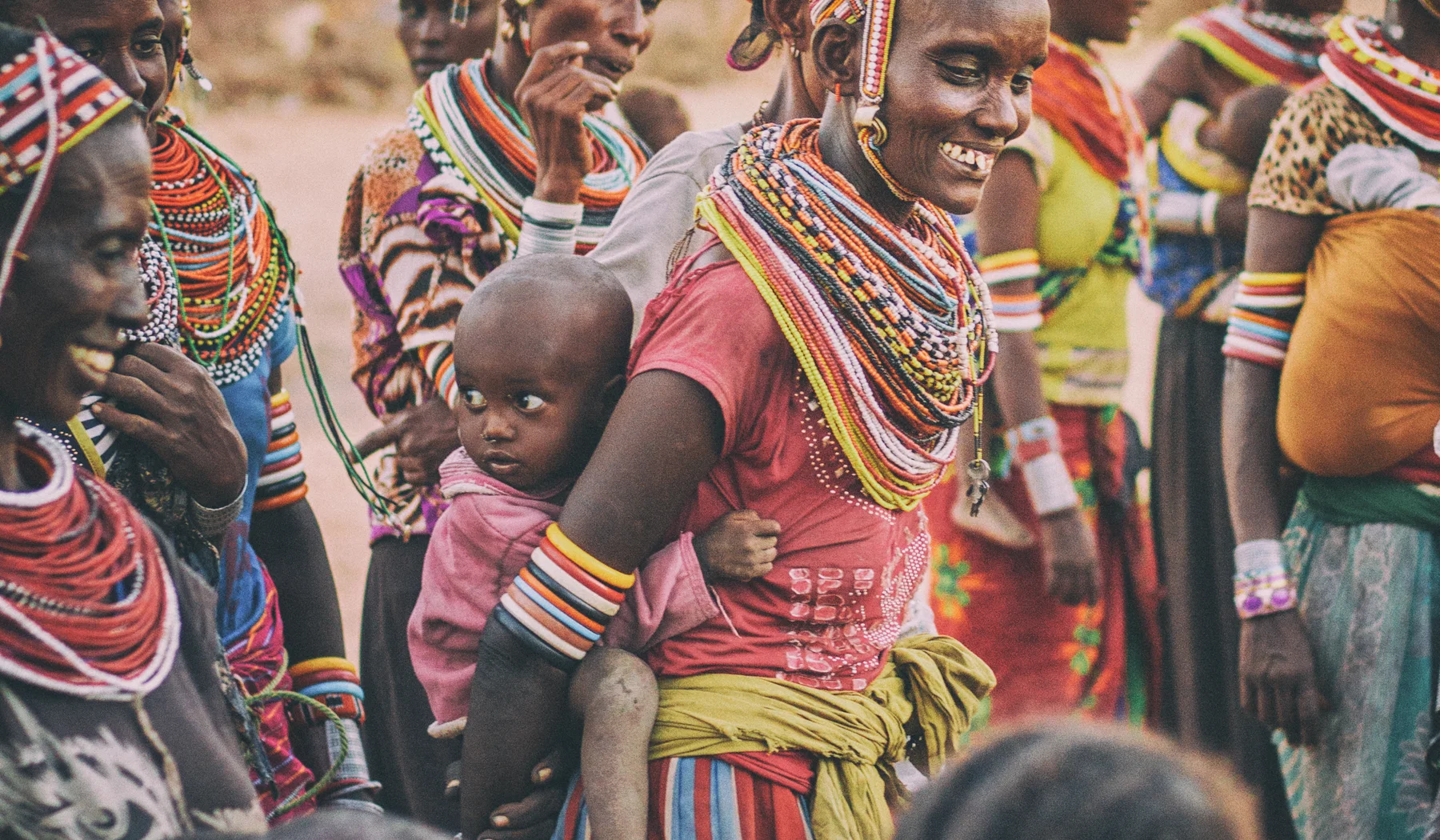 Maa-speaking community members gathered outdoors in Kenya