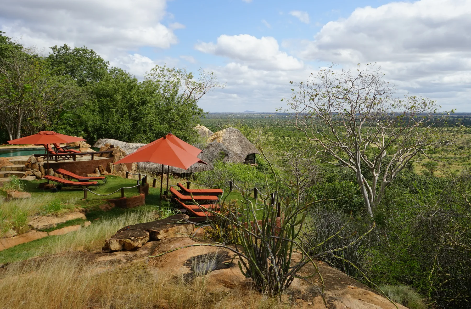Safari lodge terraces overlooking the wooded Meru National Park landscape