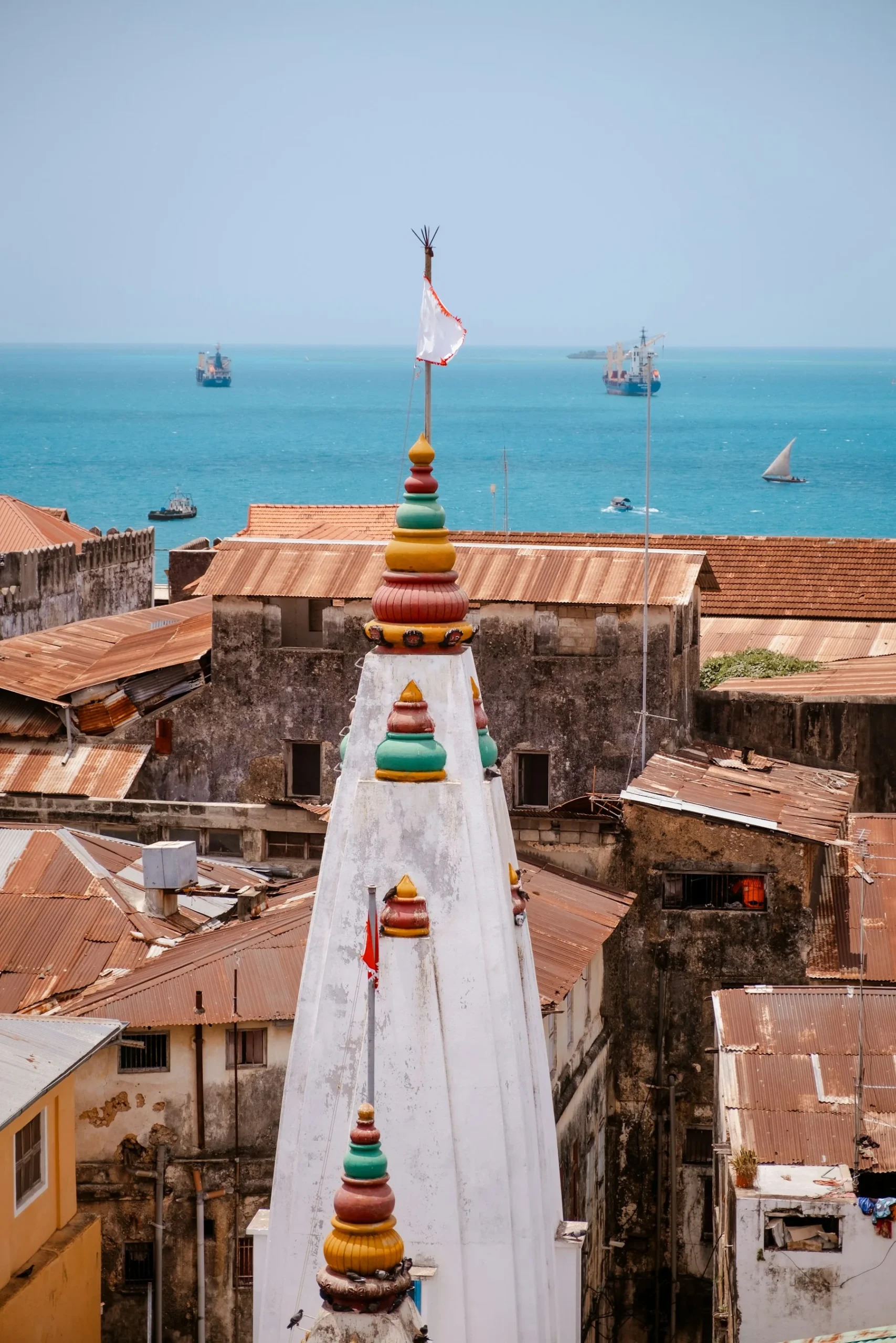 Stone Town rooftops and sea in a Zanzibar add-on guide