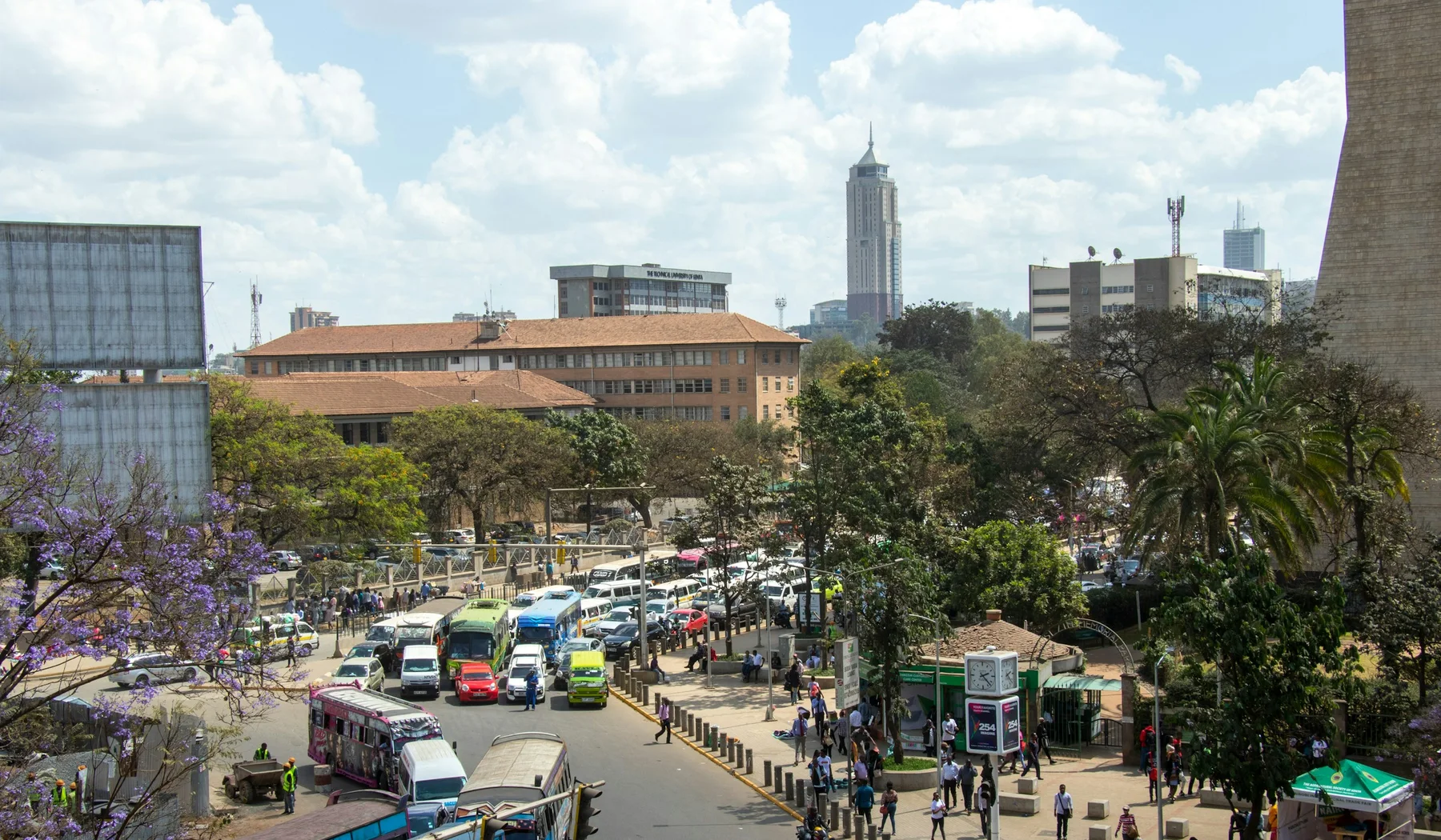 Nairobi city centre and traffic on an airport transfer route